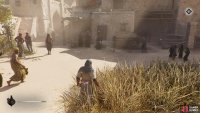 The artifact on the east is held by an NPC with a shovel.