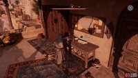 Once you climb up to the balcony, you can find the Just Rewards Enigma on the table.