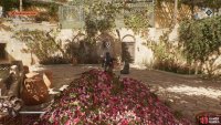 You can whistle to lure the guards near the flower beds and then kill them.