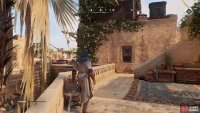 Hop to the roof of the house and take the throwing knives off of the small table.