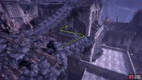 Go back on yourself, and take the ramp down to the building. Walk around it to find another roof.