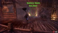 The door will be on the building behind the Enchantress.