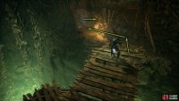 This will lead to a platform that has a gap before the next path. Jump across, head into the cave, and take the right path.