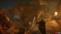 Run through the encampment and break the barricade to find a bridge.