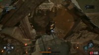 Follow the curved road up, then take the sloped pathway and jump into the broken roof.