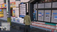 He will be standing right by this door and is in a suit.
