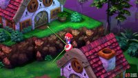 Jump on the Toad’s head to reach the house on the raised ledge.