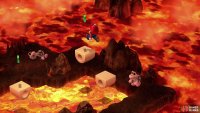 Jump onto the platforms to reach a Frog Coin, just don’t delay, as the platforms will fall into the lava if you tarry too long.