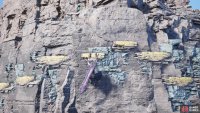 Swing over to this wall to climb over to the Cactuar Rock.