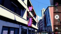 and take a picture of the purple bar sign.