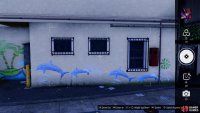 and take a picture of the Dolphin Mural 