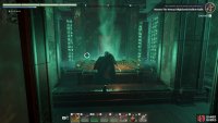 Some columns have green portals within them, leading to higher parts of the chamber.