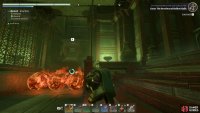 You’ll see a grapple hook point above the fireballs.