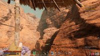 Look for a point in the cliffside that is less steep, providing a climbable way up.