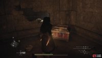 Smash the wall and you’ll find a chest containing the Anathema Achistaff.