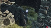 There’s another Seeker’s Token along a ruined part of the castle wall to the east of the battlefield cliffside.