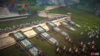 Approach the town’s walls to have your army build ramps.