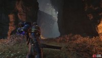 After escaping the Mechanicus Facility you’ll equip Jump Packs - advance until you find a cave and note the ledge to the upper left.