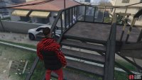 to find this action figure sitting on some stairs.