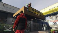 to find the action figure sitting above the  Hardcore Comic Store sign.