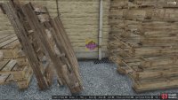 to find the monkey mosaic sitting in between a bunch of pallets.