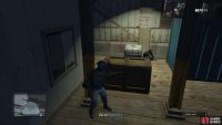 Approach Agent 14 who’s hiding behind a crate
