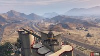 to find the signal jammer on top of the factory.