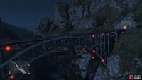 to find the signal jammer on the side of the bridge.
