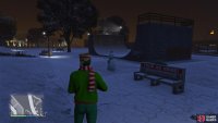 to find the Snowman standing near a skateboard ramp.
