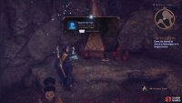 The Memento will be in the nearby small cave, next to the statue.