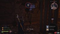 In the next room, use the power through the hole in the wall to dispel the barrier.