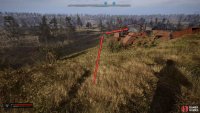 At the top of the hill, look beyond the containers to see a large pile of concrete rubble.