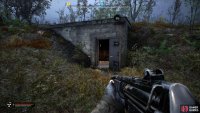 You’ll find a small bunker with its door open. Head inside.
