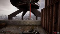 Jump over to the ladder and climb it to the top of the crane.