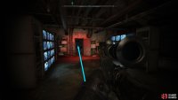 In the room of TV screens, go north through the doorway with the red light.