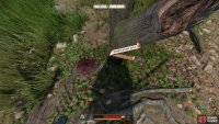 Find a Bloodied Broken Arrow in a tree near a fork in the road,