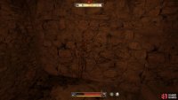 Examine this part of the wall to mark the dig location.