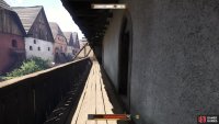 To find the Scribe, go through the Town Hall and out the back door, then up the stairs on your left to find his shop up here.