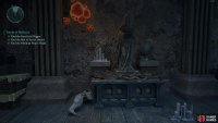 The Idol of Covert Plots sits near a statue.