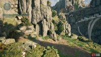 Walk under this rock formation to reach the treasure chest.
