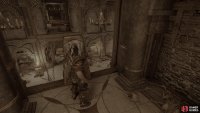 In the Catacombs, activate the lever on the upper floor to open the gate below.