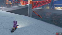 Turn around and go left under the circuit you just left.