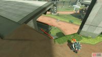 To the right of the roof is a place you can drop to.