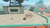 Slow down to get off the pipe and drive over the panel on top of the roof.