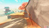 As you go around the corner, charge a jump, and release it next to the wall.
