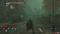 Follow the path behind the store until you reach the two paths.
