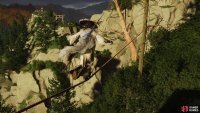 Cross a rope but keep your eye to the left for a branch you can jump and grapple over to,