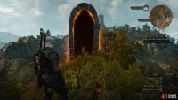 Ascend the hill and enter the portal.