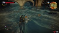 Swim west down the canal towards a bridge, stopping to loot two chests,
