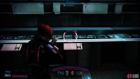 On your way back to the bridge, search another building to find more intel for the Eden Prime Support war asset,